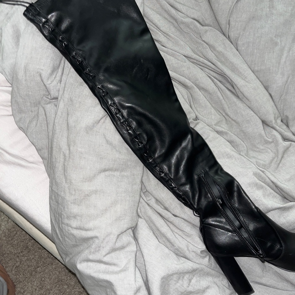 Above knee tie up boot